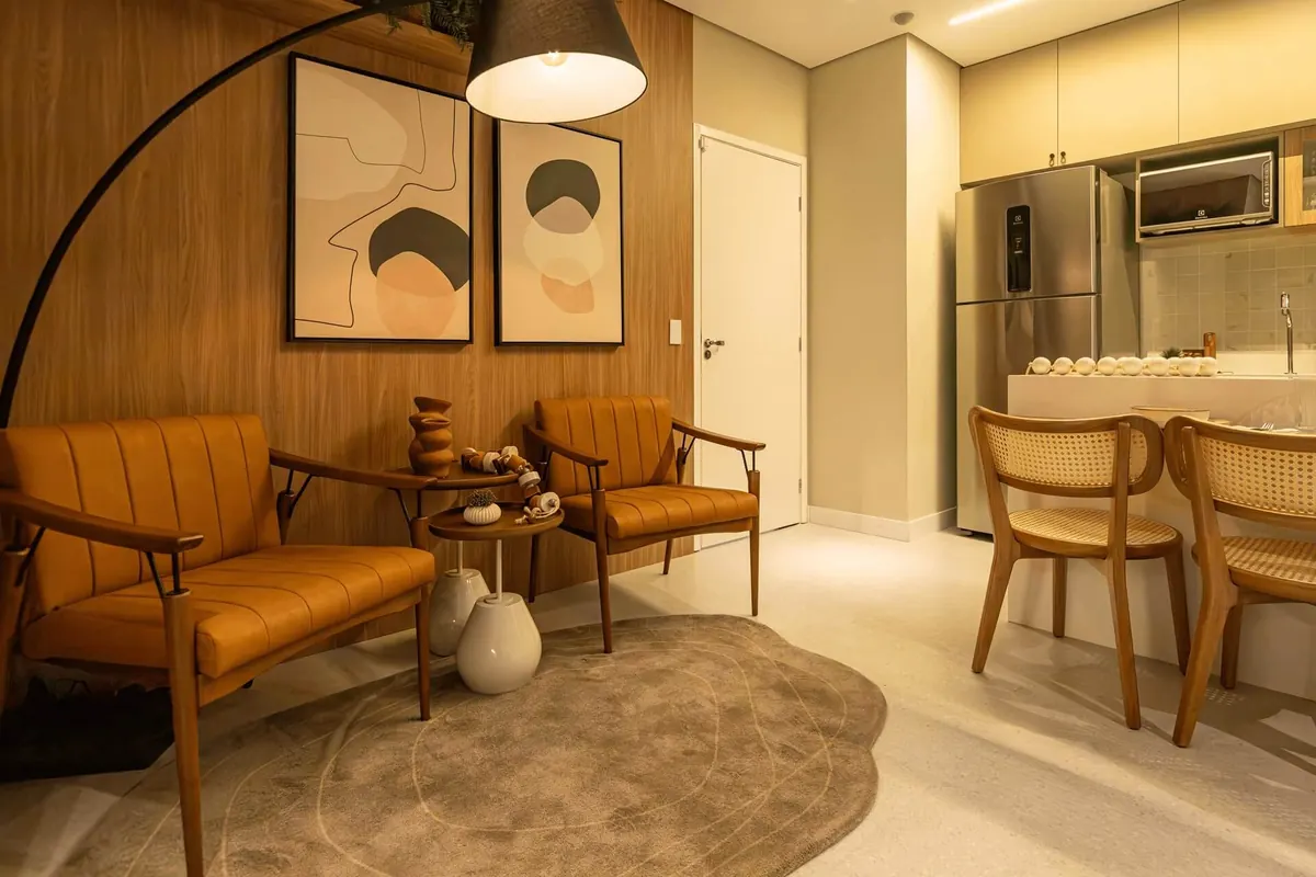 Living com poltronas do apartamento decorado